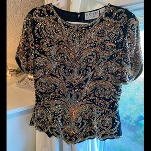 Oleg Cassini sequins top, size medium, zipper back, excellent condition.